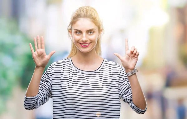 Jonge Mooie Blonde Vrouw Dragen Strepen Trui Geïsoleerde Achtergrond Weergeven — Stockfoto