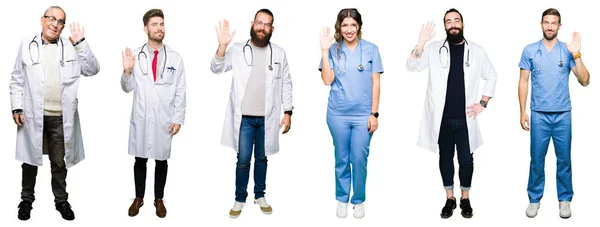 一群医生和外科医生的人在白色的孤立的背景放弃打招呼快乐和微笑 友好的欢迎姿态 — 图库照片