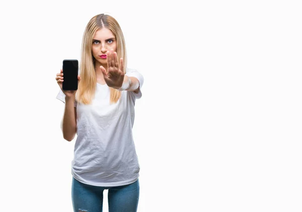 Mladá Krásná Blondýnka Ukazuje Smartphone Izolované Pozadí Otevřenou Rukou Dělá — Stock fotografie