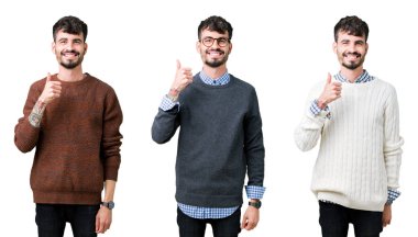 Kolaj bir hareketi el ile mutlu yaşasın yapıyor izole arka plan üzerinde bir kazak giyen genç adam. Başarı gösteren kameraya bakarak ifade onaylama.