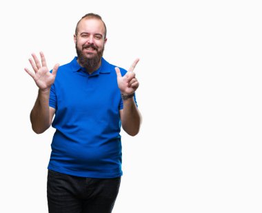 Üzerinde mavi gömlek giymiş genç beyaz hipster adam arka plan gösteren izole ve parmakları ile işaret kendinden emin ve mutlu gülümseyerek süre yedi numara.