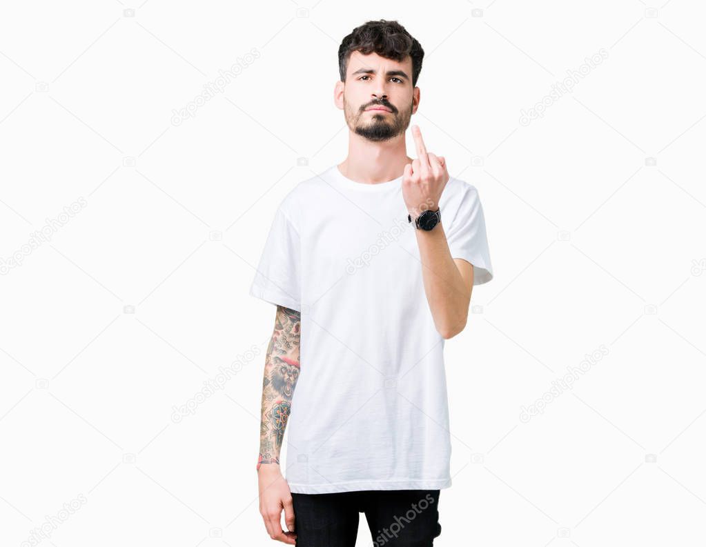 Young handsome man wearing white t-shirt over isolated background Showing middle finger, impolite and rude fuck off expression