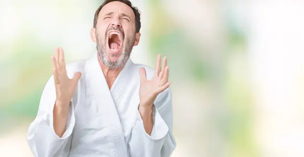 Hombre Mayor Mediana Edad Guapo Con Uniforme Kimono Sobre Fondo —  Fotos de Stock