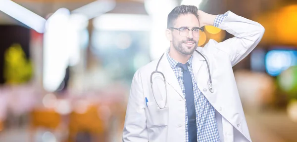 Guapo Joven Doctor Hombre Sobre Aislado Fondo Sonriente Seguro Tocar — Foto de Stock