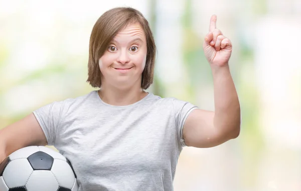 Junge Erwachsene Frau Mit Syndrom Hält Fußballball Über Isolierten Hintergrund — Stockfoto