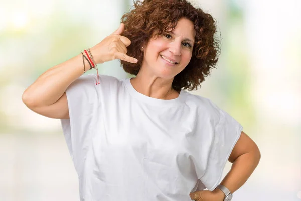 Hermosa Mujer Mediana Edad Ager Vistiendo Camiseta Blanca Sobre Fondo —  Fotos de Stock