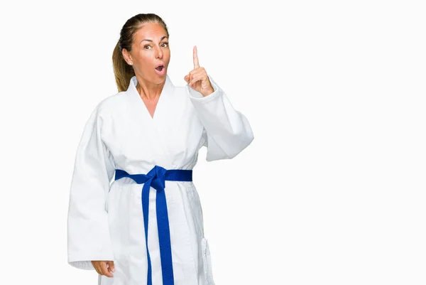 Middle Age Adult Woman Wearing Karate Kimono Uniform Isolated Background — Stock Photo, Image