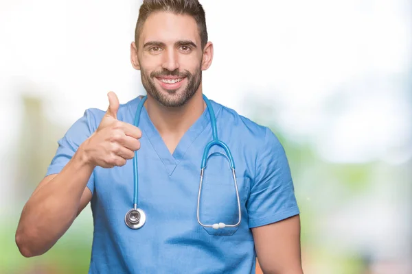 Handsome Young Doctor Surgeon Man Isolated Background Doing Happy Thumbs — Stock Photo, Image
