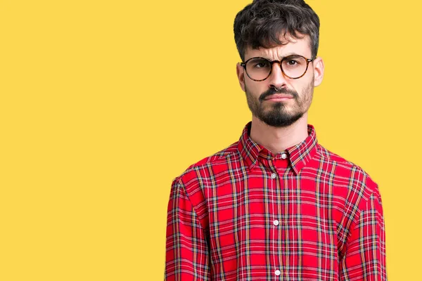 Ung Vacker Man Glasögon Över Isolerade Bakgrund Deprimerad Och Oroa — Stockfoto