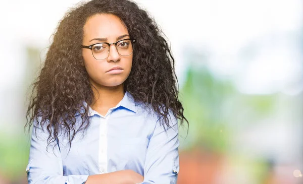 Young Beautiful Business Girl Curly Hair Wearing Glasses Skeptic Nervous — Stock Photo, Image