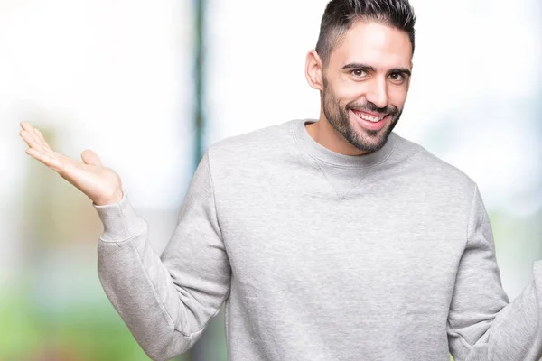 Joven Hombre Guapo Con Sudadera Sobre Fondo Aislado Sonriendo Mostrando — Foto de Stock