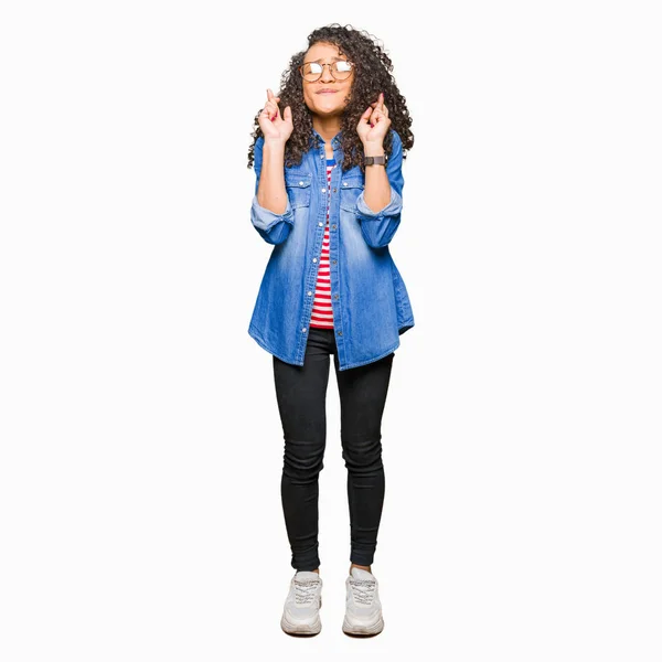 Young Beautiful Woman Curly Hair Wearing Glasses Smiling Crossing Fingers — Stock Photo, Image
