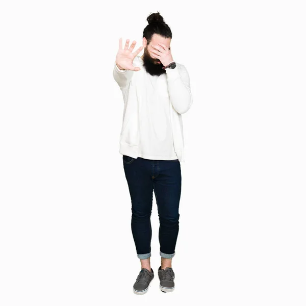 Young Man Long Hair Beard Wearing Sporty Sweatshirt Covering Eyes — Stock Photo, Image