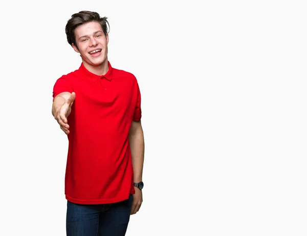 Joven Hombre Guapo Con Camiseta Roja Sobre Fondo Aislado Sonriendo — Foto de Stock