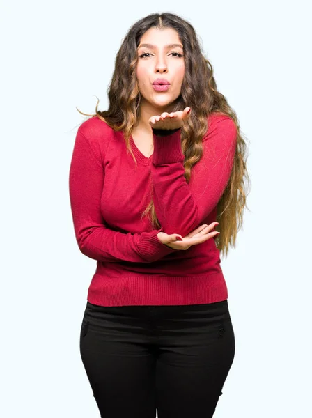 Young Beautiful Woman Wearing Red Sweater Looking Camera Blowing Kiss — Stock Photo, Image