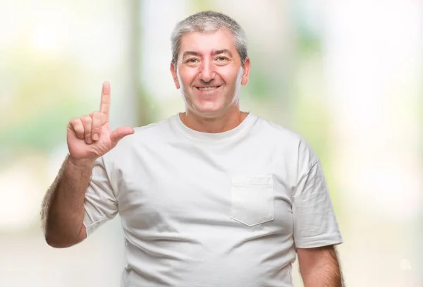 Hombre Mayor Guapo Sobre Fondo Aislado Mostrando Señalando Con Dedo —  Fotos de Stock