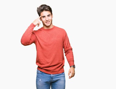 İzole genç yakışıklı adam arka plan bir parmak, harika bir fikir ya da düşünce, iyi hafıza ile baş gösteren gülen