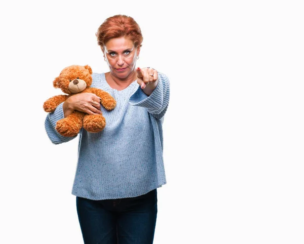 Senior Caucasian Woman Holding Teddy Bear Isolated Background Pointing Finger — Stock Photo, Image