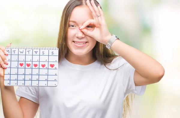 Jonge Kaukasische Vrouw Houdt Van Menstruatie Kalender Geïsoleerde Achtergrond Met — Stockfoto