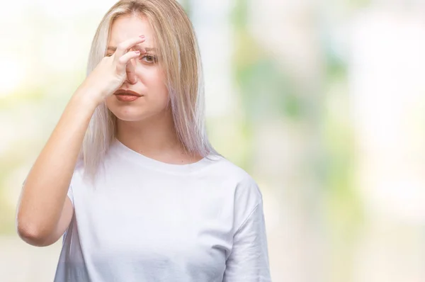 Young Blonde Woman Isolated Background Smelling Something Stinky Disgusting Intolerable — Stock Photo, Image