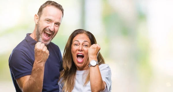 Pareja Informal Hispana Mediana Edad Sobre Fondo Aislado Muy Feliz —  Fotos de Stock