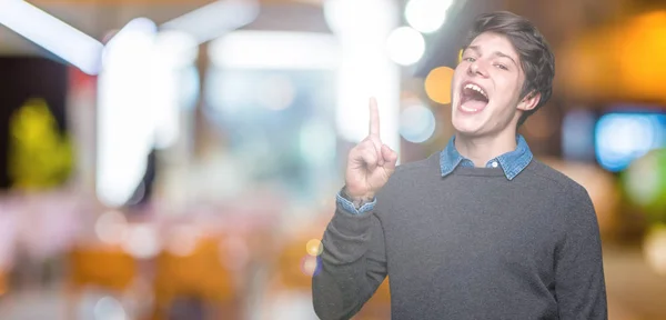 Joven Hombre Elegante Guapo Sobre Fondo Aislado Señalando Dedo Hacia —  Fotos de Stock