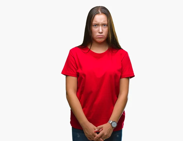 年轻美丽的白种女人在孤立的背景下怀疑和紧张 皱着眉头心烦因为问题 消极的人 — 图库照片