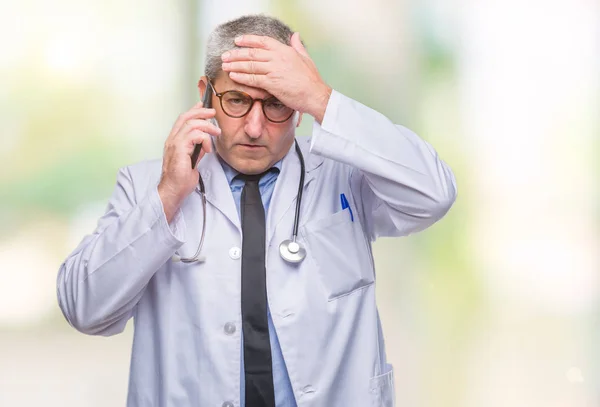 Handsome Senior Doctor Man Talking Smarpthone Isolated Background Stressed Hand — Stock Photo, Image