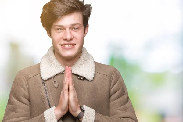 Young Handsome Man Wearing Winter Coat Isolated Background Praying Hands — Stock Photo, Image