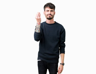Yakışıklı delikanlı izole arka plan üzerinde yapıyor İtalyan jest el ve parmak emin ifadesiyle