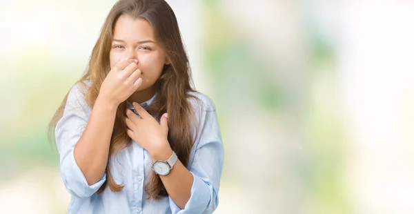 Young Beautiful Brunette Business Woman Isolated Background Smelling Something Stinky — Stock Photo, Image