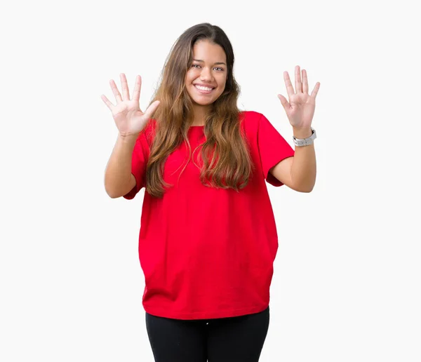Joven Hermosa Morena Vistiendo Camiseta Roja Sobre Fondo Aislado Mostrando — Foto de Stock