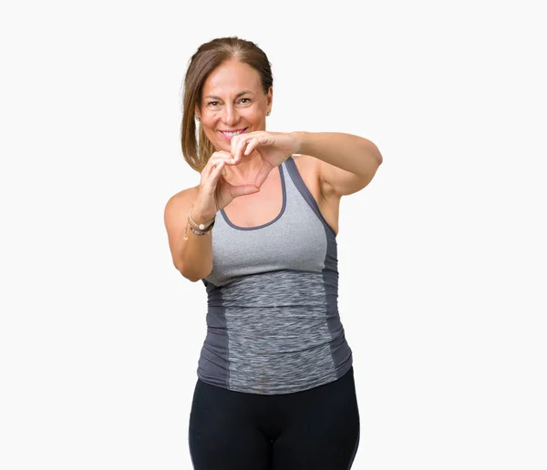 Mooie Middelbare Leeftijd Vrouw Sport Kleding Dragen Geïsoleerde Achtergrond Glimlachend — Stockfoto