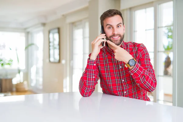 Handsome Man Talking Smartphone Very Happy Pointing Hand Finger — Stock Photo, Image