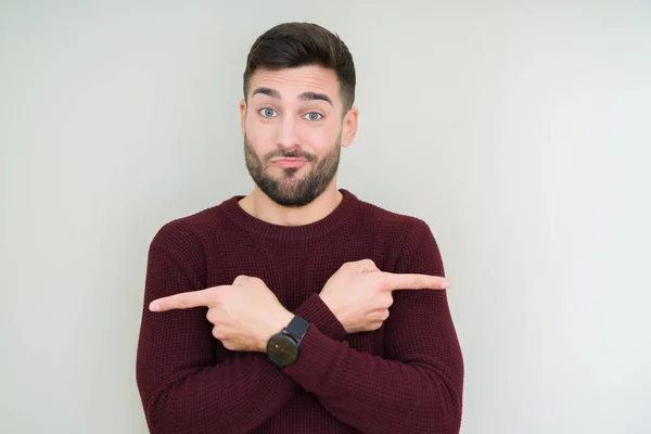 Jovem Homem Bonito Vestindo Uma Camisola Sobre Fundo Isolado Apontando — Fotografia de Stock