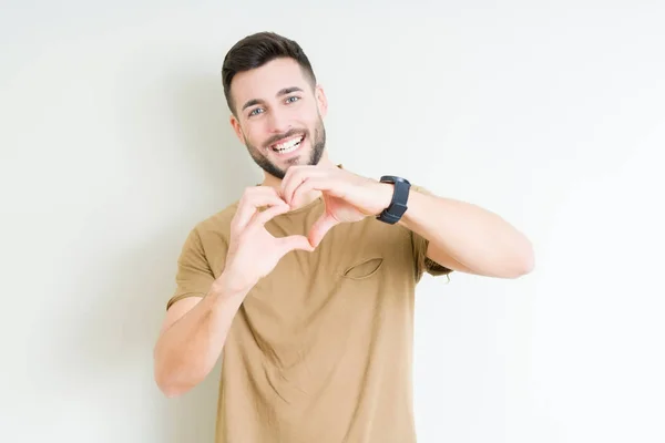 Joven Hombre Guapo Sobre Fondo Aislado Sonriendo Amor Mostrando Símbolo —  Fotos de Stock