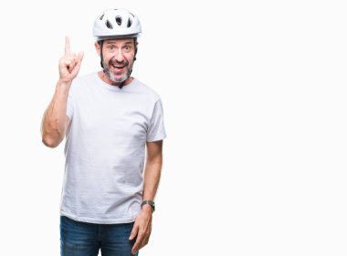 Bisiklet Emanet helment giyen orta yaş üst düzey ağarmış bisikletçi adam arka plan başarılı fikirle parmağı yukarıyı izole. Çıktıktan ve mutlu. Bir numara.