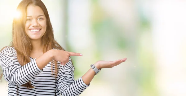 Young Beautiful Brunette Woman Wearing Stripes Sweater Isolated Background Amazed — Stock Photo, Image