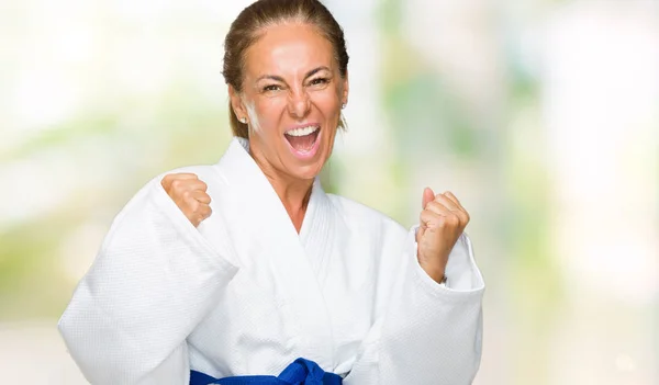 Middle Age Adult Woman Wearing Karate Kimono Uniform Isolated Background — Stock Photo, Image