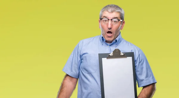 Handsome Senior Inspector Man Holding Clipboard Isolated Background Scared Shock — Stock Photo, Image