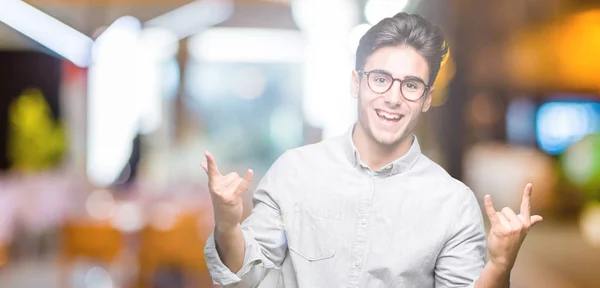 Young Handsome Man Wearing Glasses Isolated Background Shouting Crazy Expression — Stock Photo, Image