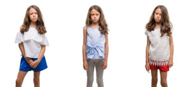 İspanyol genç çocuk izole arka plan şüpheci ve sinir, papatyanın üzgün sorun nedeniyle üzerinde kolaj. Negatif kişi.