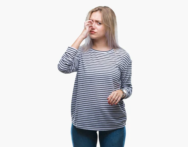 Young Blonde Woman Isolated Background Smelling Something Stinky Disgusting Intolerable — Stock Photo, Image