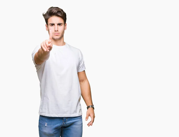 Jovem Homem Bonito Vestindo Camiseta Branca Sobre Fundo Isolado Apontando — Fotografia de Stock