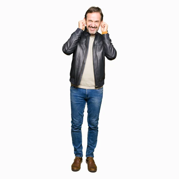 Middle Age Handsome Man Wearing Black Leather Jacket Covering Ears — Stock Photo, Image
