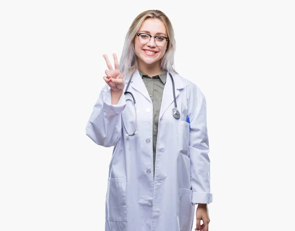 Young Blonde Doctor Woman Isolated Background Showing Pointing Fingers Number — Stock Photo, Image