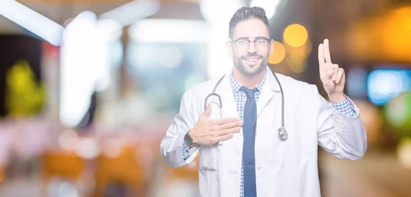 Handsome Young Doctor Man Isolated Background Swearing Hand Chest Fingers — Stock Photo, Image