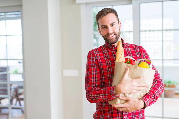 Handsome Man Holding Paper Bag Full Fresh Groceries Home — Stock Photo, Image