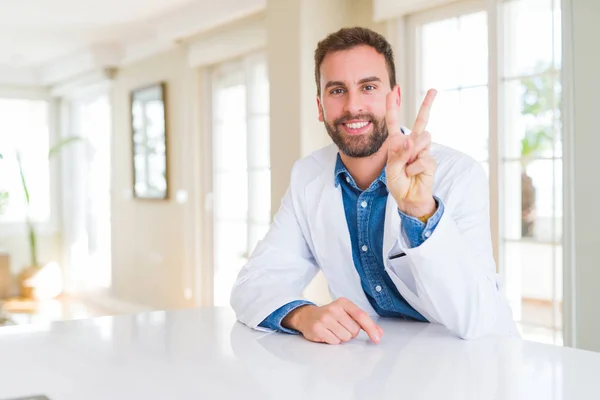 Handsome Doctor Man Wearing Medical Coat Clinic Showing Pointing Fingers — Stock Photo, Image