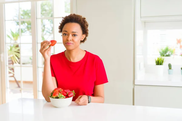 Young African American Woman Eating Fresh Strawberries Breakfast Confident Expression — Stock Photo, Image